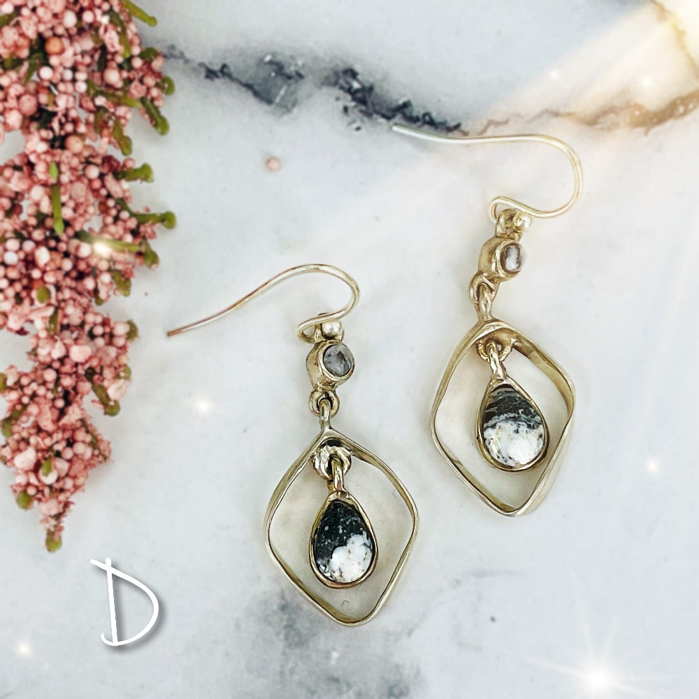 Bright Eyes: White Buffalo Earrings